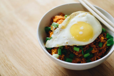 Dream of foreign lands and satisfy those South Korean cravings when you learn how to make this mouth-watering Kimchi Fried Rice at home. Indulgent and economical, you need this dish in your life!